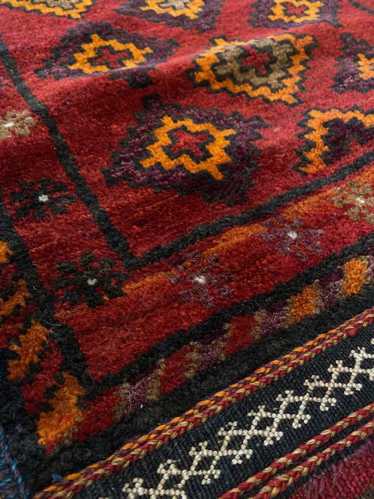 Bag – wool, - flatweave/pile - red ground - stepped diamond repeat - sides and base tassled.108 x 60cm Image 1++